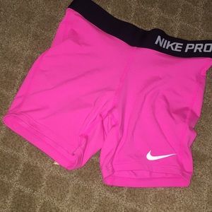 Hot pink nike pros